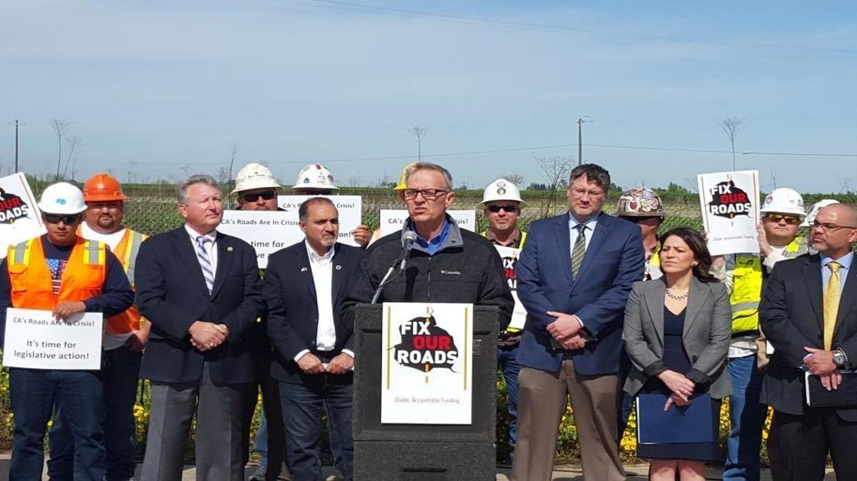 Mark Kyle of the Operating Engineers Local 3 construction union addresses the proposed cuts at a news conference on Wednesday in Centerville.