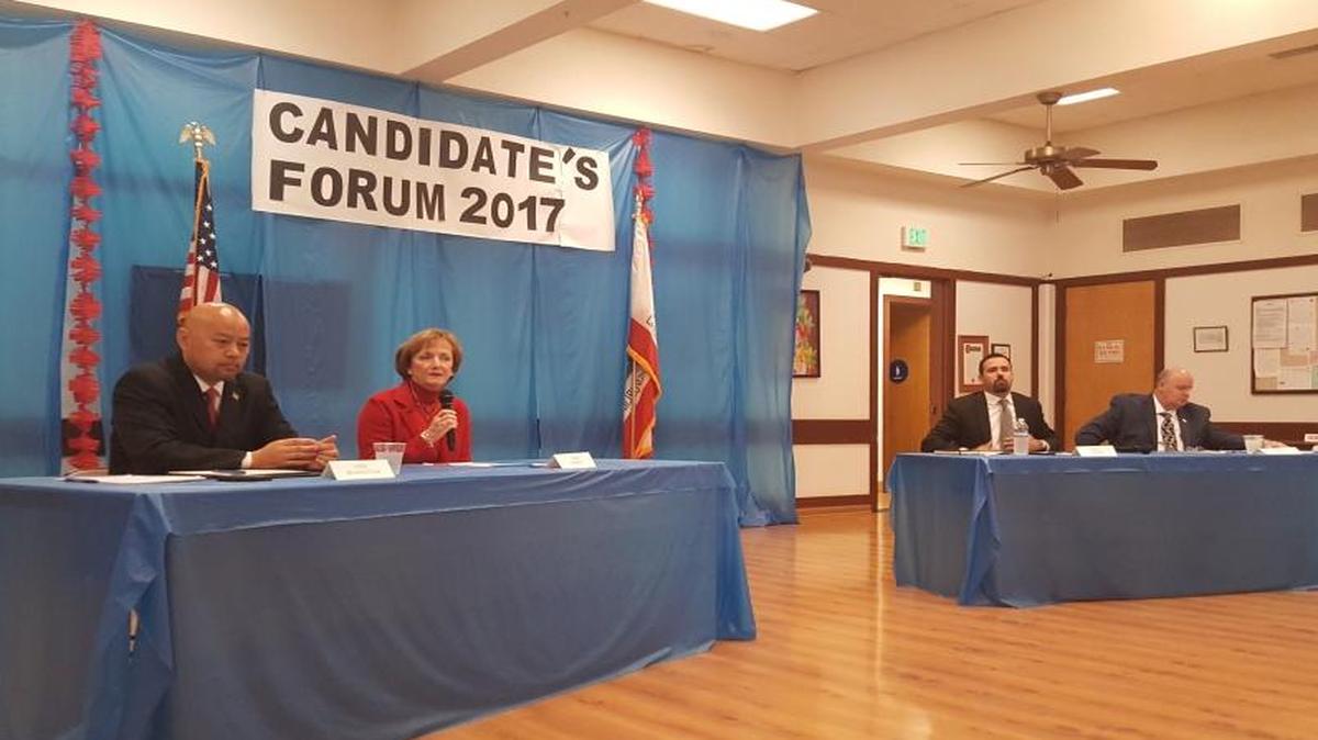 From left, Vong Mouanoutoua, the former Clovis Planning Commission chairman, and City Council incumbent Lynne Ashbeck are running for four-year seats on the Clovis City Council. Paul Soares and Drew Bessinger are running for a two-year seat. Aaronjack Perry was not in attendance.