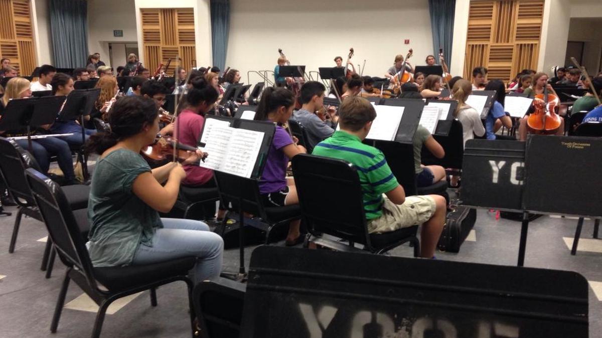 Youth Orchestra of Fresno practices for an upcoming concert.