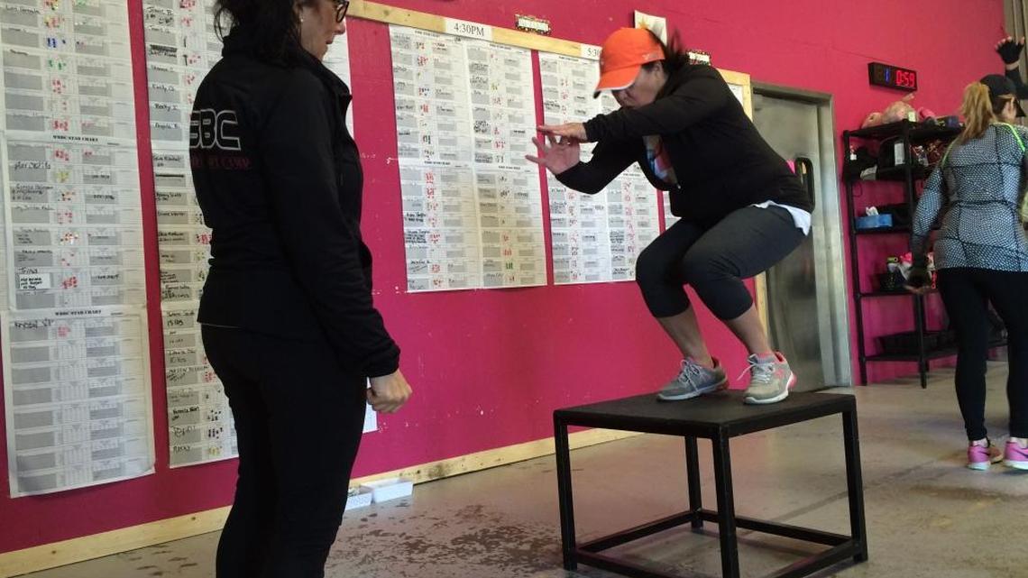 WBBC women perform box jumps.