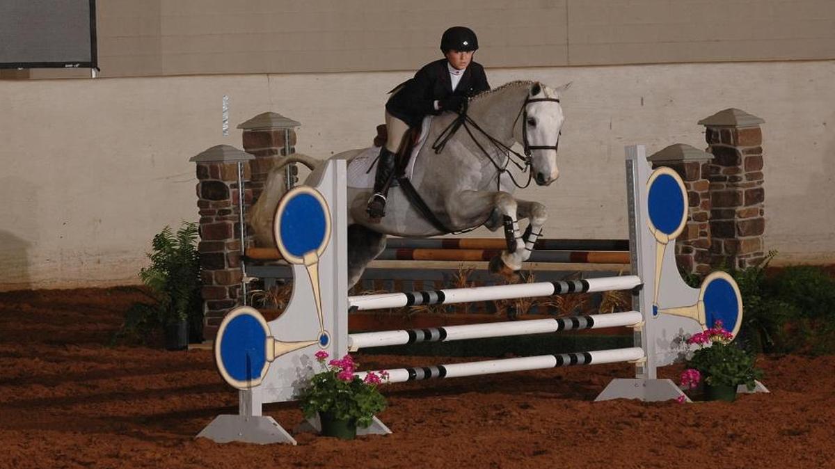 Sierra Swaffar rides English style in competition for the Fresno State Equestrian team.