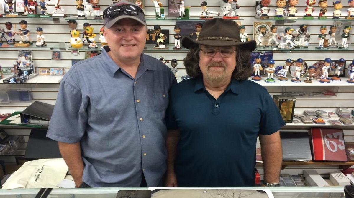 
Brad Stoops, owner of Clovis Sports Cards & Collectibles, stands with friend Randy Guijarro, owner of the second known photo of Billy the Kid. 
