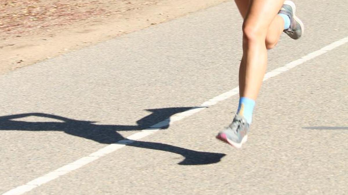Katie Nili, a junior at Buchanan High School, runs on the Clovis Trail during a recent practice of the Buchanan cross country team.