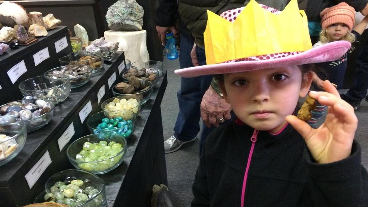 Keira Momen, 5, of Washington, searches for stones for her growing collection while visiting family in Clovis over winter vacation.