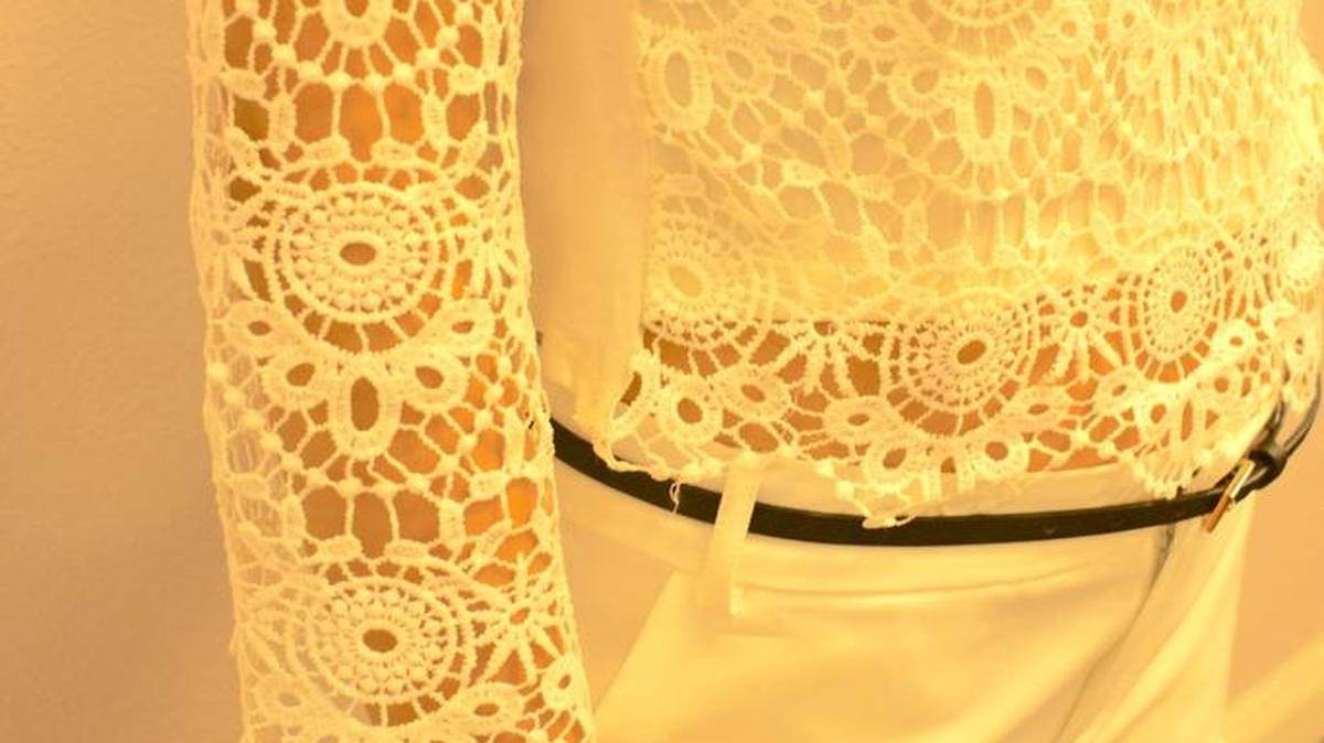 Neutral colors are popular this season, like lacy top in white at Pum Bum Society.