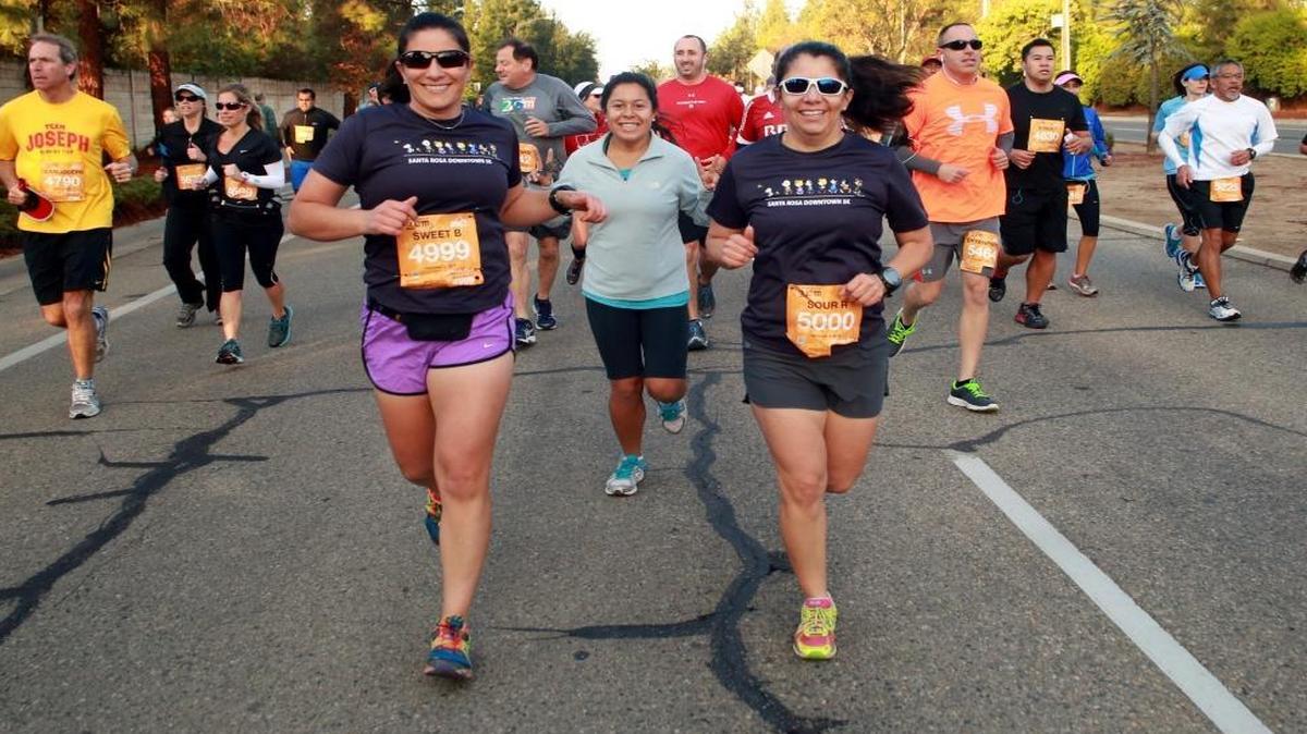 Sisters Begered Ghazi and Runak Ghazi, of Fresno, run in the 2014 Two Cities Marathon & Half. This year’s race will be held Sunday, Nov. 6.