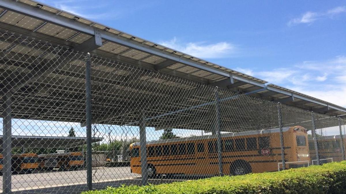 Solar panels throughout Clovis Unified School District save about $2.7 million annually in energy bills — and provide shade for vehicles.