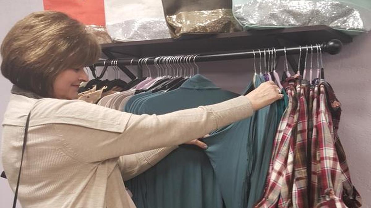 Judy Nachtigal shops during the grand opening of Xena Rose Boutique this month.