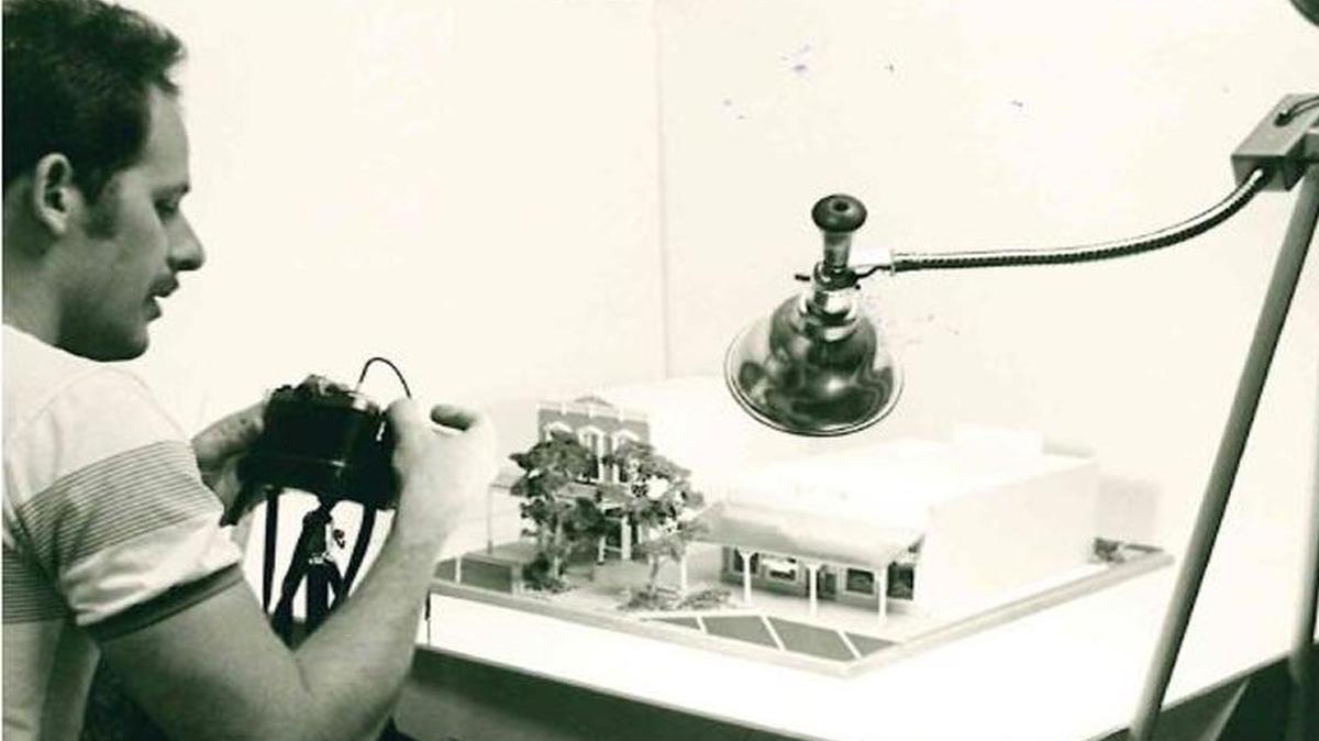 City of Clovis planning director Dwight Kroll, pictured here in 1981 when he was an assistant planner, works on a model of his vision for Old Town Clovis.