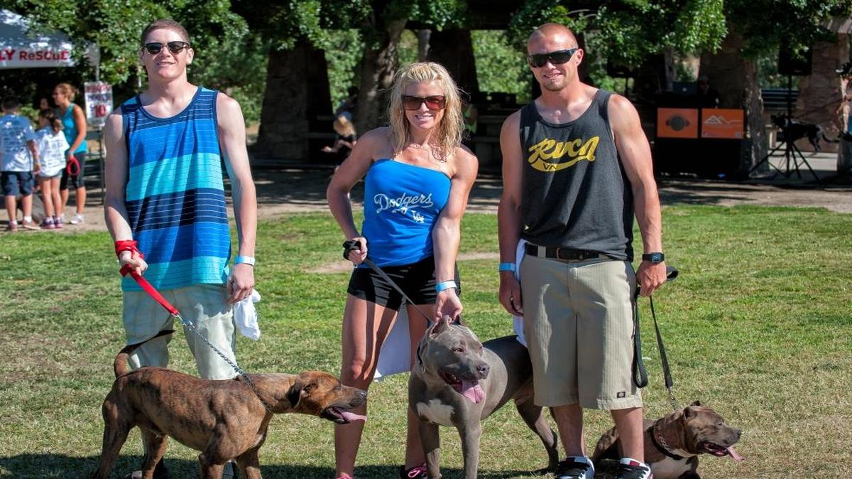 Ryan Marr with Diesel, Gina Leigh with Rhyno and Nick Hoveiler with Spade at last year’s Spring Bully Walk.