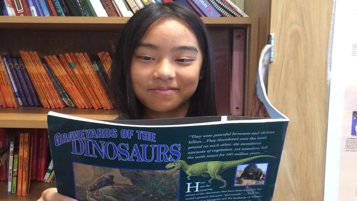 Kalia Lee enjoys reading non-fiction. She was honored with a national 180 Student Award for turning her academic career around through a reading intervention program at Temperance-Kutner Elementary.