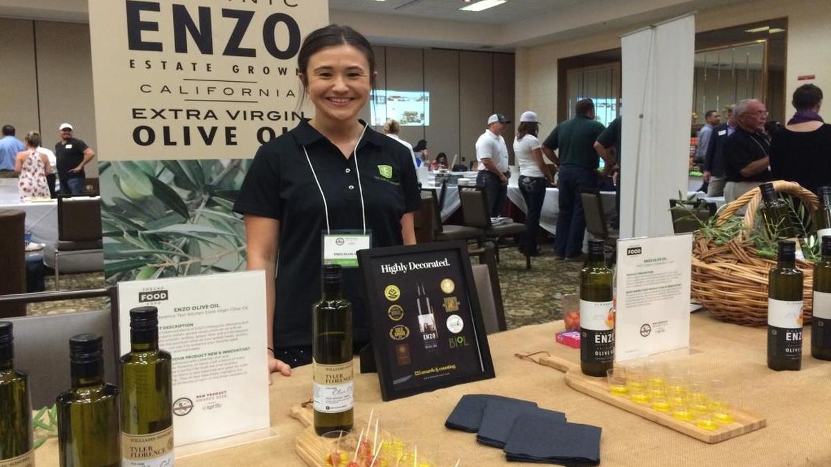 Kari Ball, sales and marketing coordinator for Enzo Olive Oil Company, debuted the Tyler Florence Test Kitchen EVOO and ENZO Organic Clementine Crush at a media preview of next week’s Fresno Food Expo.