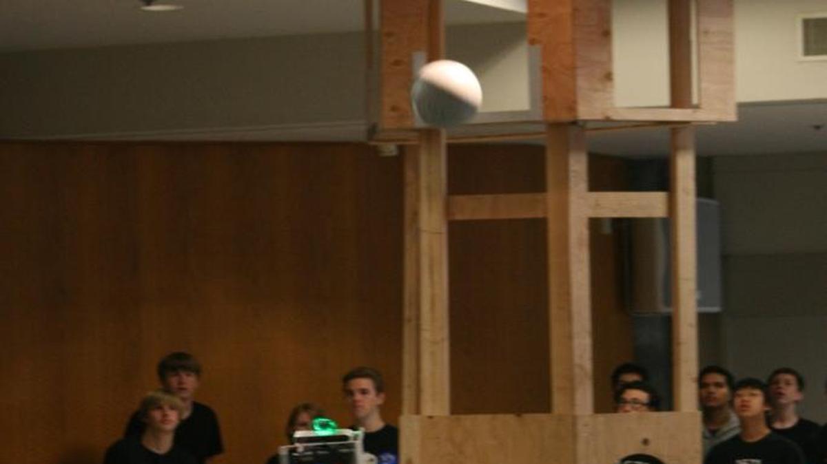 DOC XII shoots a ball through a target similar to the one that will be at competitions.