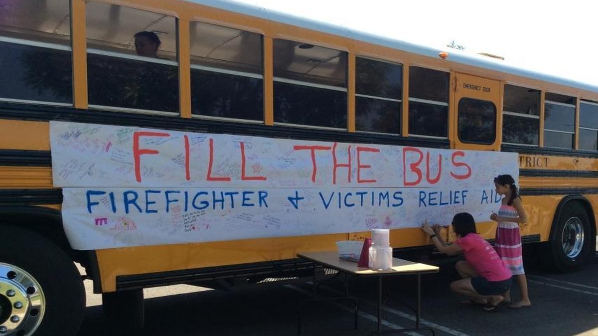 
Volunteers hung a banner for donors to sign and share their appreciation for the firefighters.
