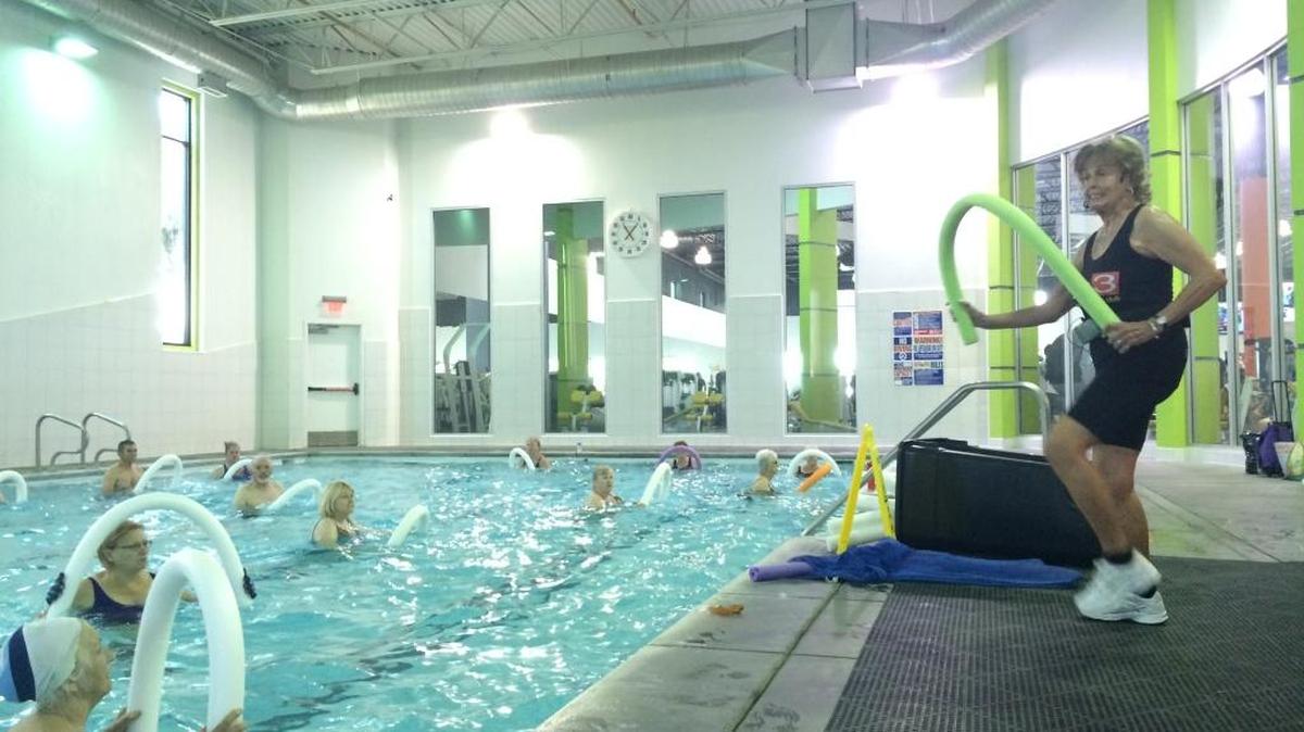 Patsy Helgren, 80, teaches aqua aerobics every Monday at GB3 in Clovis. She demonstrates the moves on land while her students exercise in the pool.