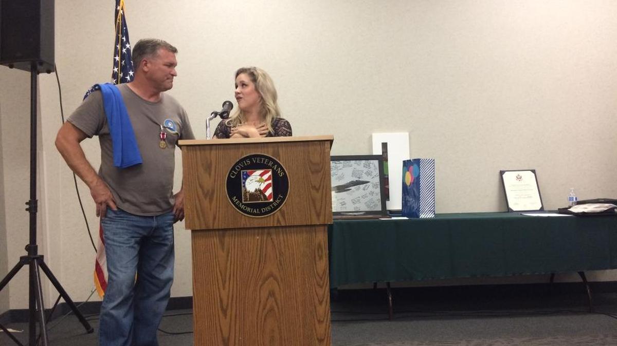 
Kirsten Roberts, right, gives a speech about her father, SMSgt. William “Billy” Ferreira, at his retirement party.
