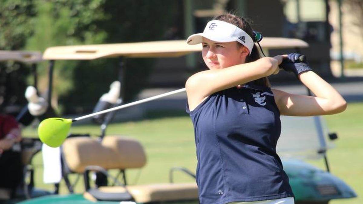 Morgan Polley, a junior and the No. 1 player on the Clovis East High School golf team, is pictured on the first hole at Belmont Country Club.