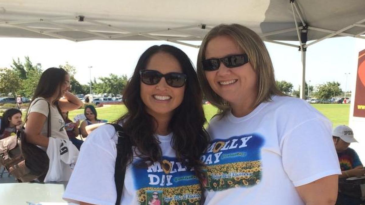 Kimra Garcia and Rachel Garcia sport their Molly Day T-shirts while they wait to donate blood.