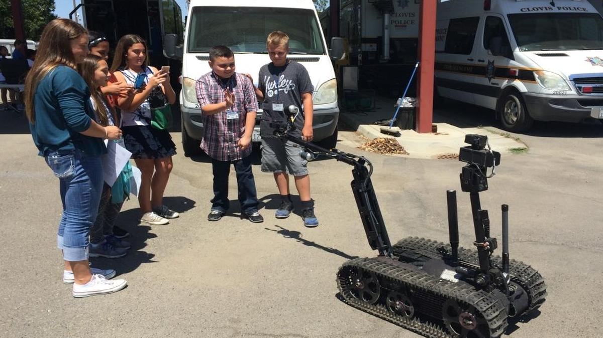 Students interact with the Clovis Police Department’s EOD robot during Chief for a Day events on May 31.