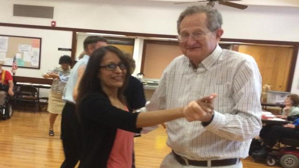 Trini Mora dances with Jim Polanowski.