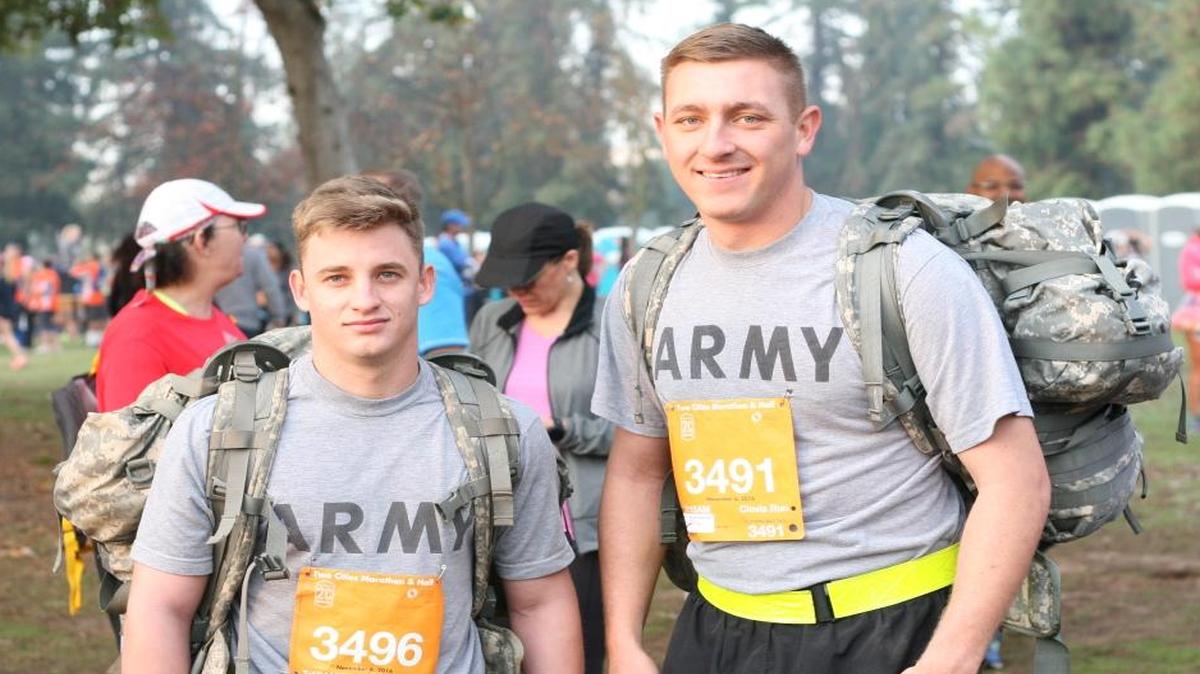 Ryan Carder and Anthony Mosqueda completed 13.1 miles with 40-pound ruck sacks.