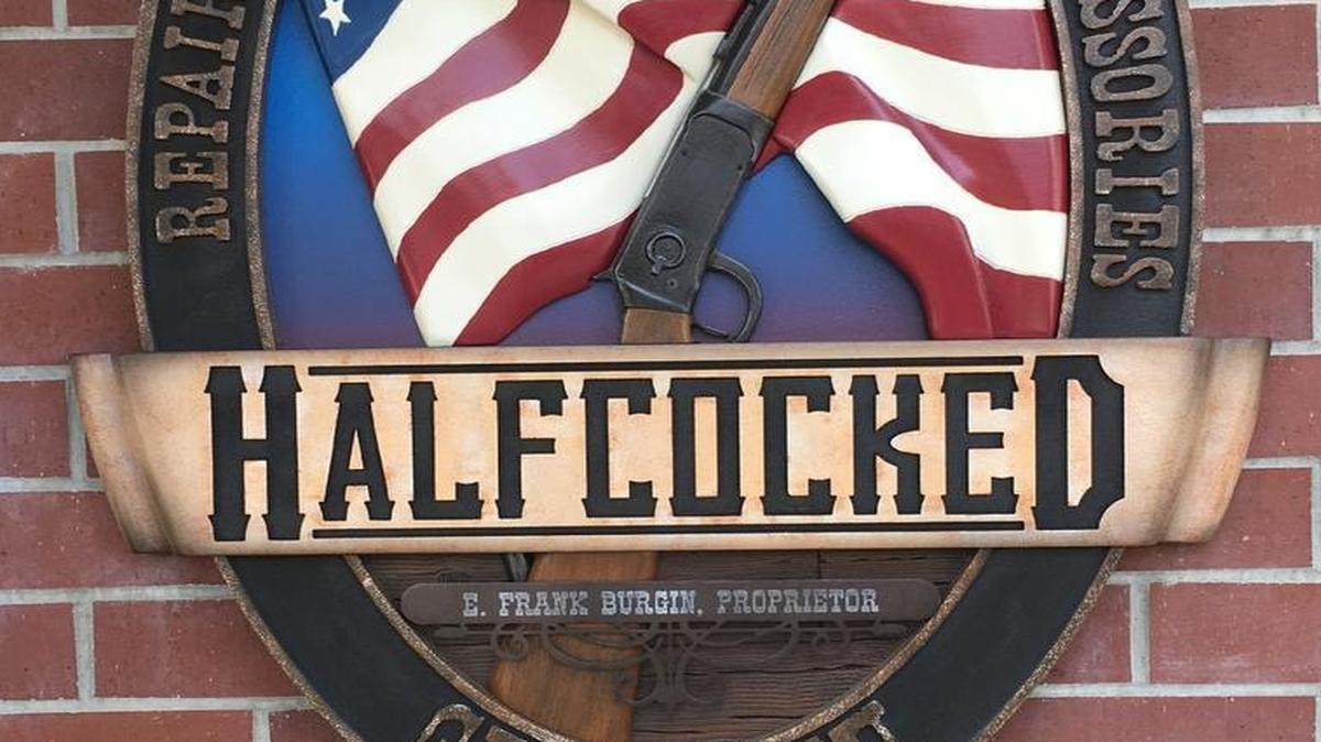 The sign hanging outside the entrance to Halfcocked features a depiction of “the gun that won the west,” an 1894 Winchester repeater rifle — a fitting look for its home in Old Town Clovis.