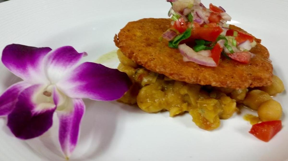 An aloo tikki (potato cake) is artfully presented at the Elephant Lounge.