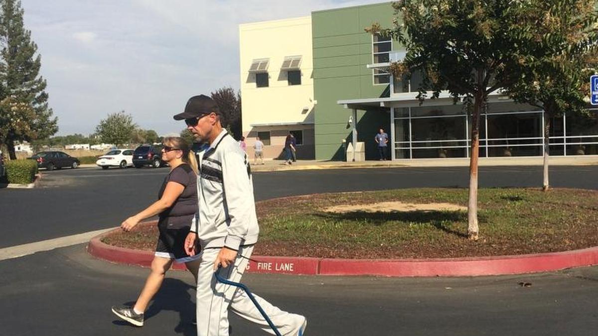 Cheri Aitken and Doug Dorsey walk for three hours before their weekly weight loss meeting at Kaiser Permanente’s Clovis Medical Offices.