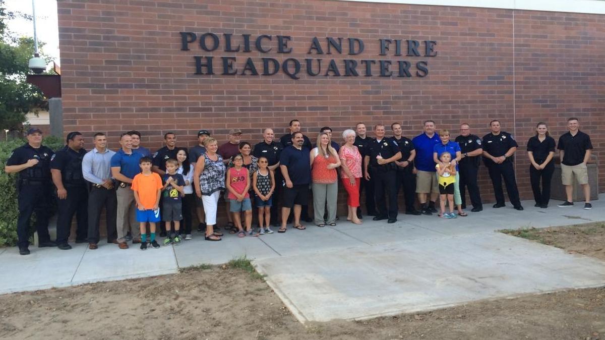 Clovis Police officers mingled with the public during a surprise law enforcement appreciation event organized by Brandi Asacker.