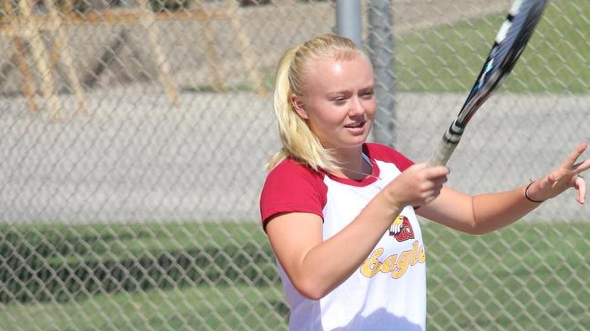 Junior Janie Ellis, the defending Central Section singles champion, warms up during practice at Clovis West High School.