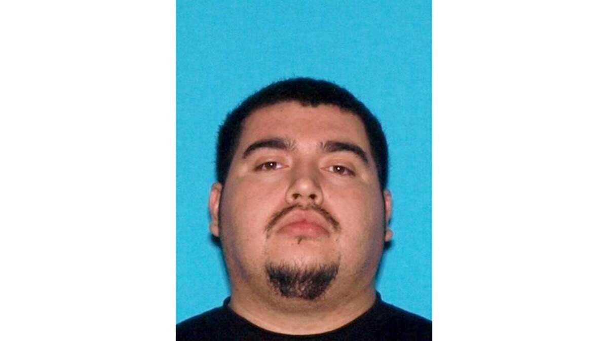 Moses Martinez, 25, was booked on charges of felony vandalism after two gates at the Fresno IRS Processing Center were knocked down by a driver in a road rage incident.