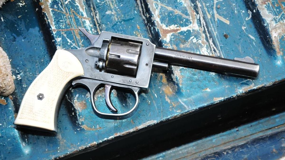 Police say the juvenile hid the weapon in a laundry dryer.