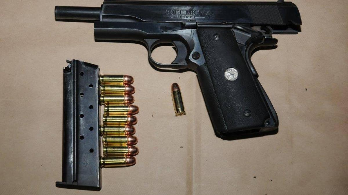 A Colt semi-automatic firearm was recovered after a pursuit.