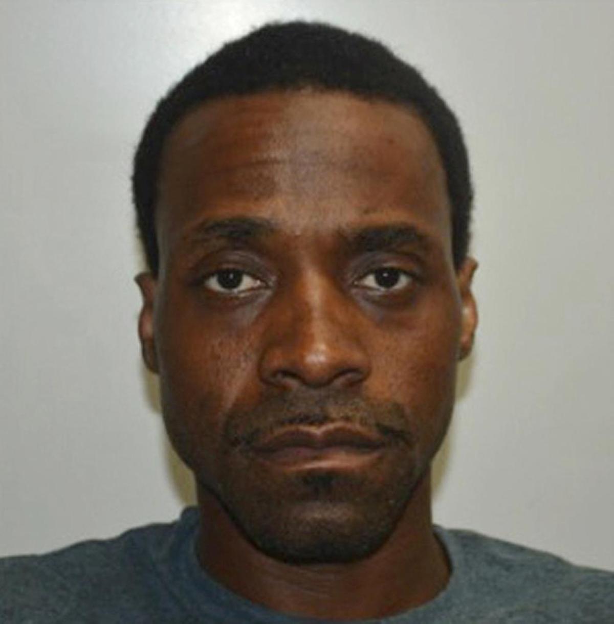 This undated photo provided by the Fresno Police Department shows Kori Ali Muhammad, a suspect in the Fresno, Calif., shooting on Tuesday, April 18, 2017.