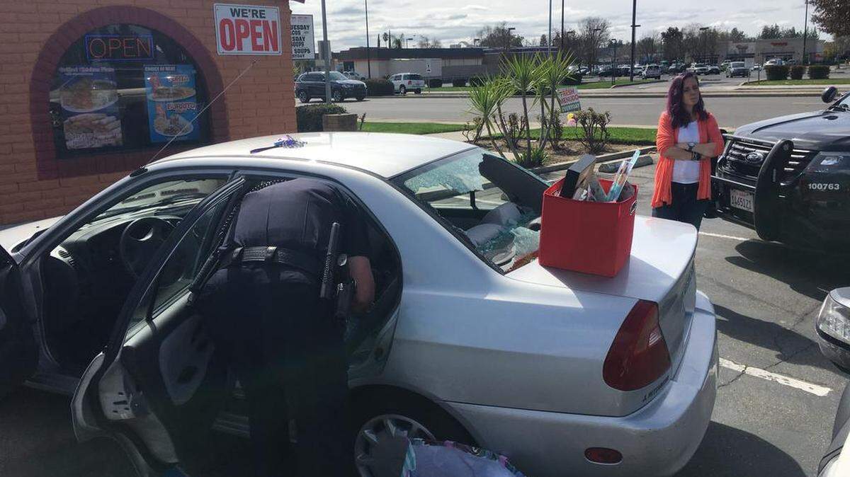 Fresno police say the window of a suspects’ Mitsuibishi was smashed during wild pursuit.