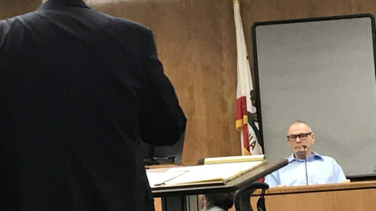 As prosecutor Nathan Lambert asks questions,  Gary Dale Poole testifies from the witness stand, telling a Fresno Superior Court jury on Wednesday, March 28, 2018, that he didn't strangle his cellmate, 62-year-old Michael Stauff, inside the Fresno County Jail in April 2014. A jury on Thursday, March 29, 2018, found Poole guilty of first-degree murder.