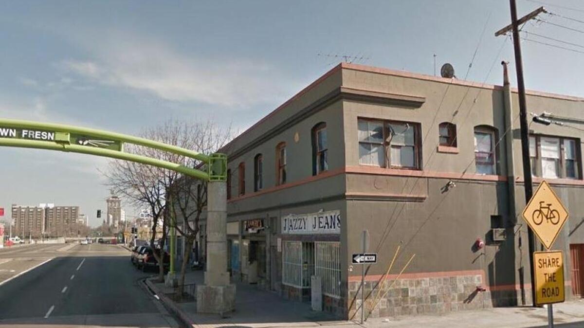 The Fresno Police Department’s Downtown Policing Unit served a search warrant at a room at a downtown Fresno hotel and found two men along with drugs, guns and cash.