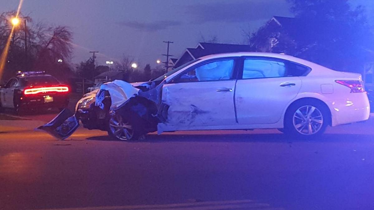 A domestic violence suspect fleeing officers hit this passing car during a brief chase through downtown and southwest Fresno Wednesday night, police said.