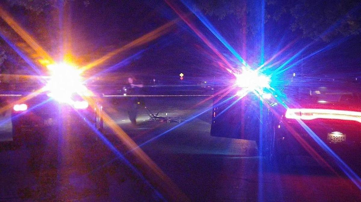 Fresno police investigate a shooting in central Fresno on Tuesday night that sent a man to a hospital in critical condition. He was riding a bicycle, center of the photo, when he was shot.