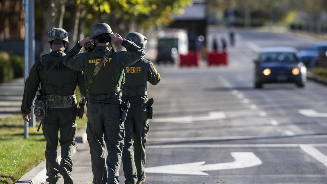 Merced County Sheriff SWAT members enter the University of California, Merced campus after a stabbing in Merced, Calif., Wednesday, Nov. 4, 2015.