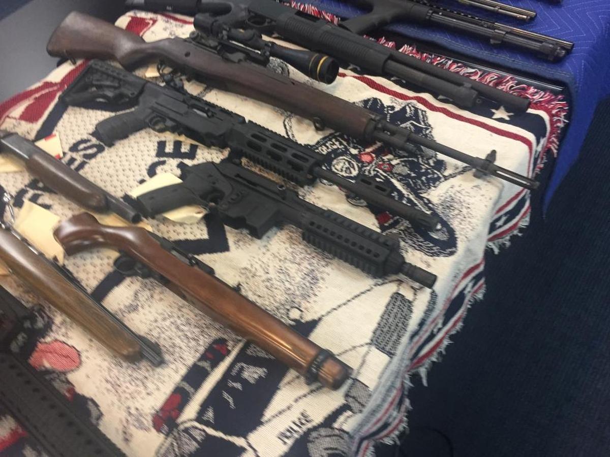 Weapons, including AR-15 assault rifles and high-caliber rifles, were seized from reputed gang members by Fresno police during a crackdown on shootings.