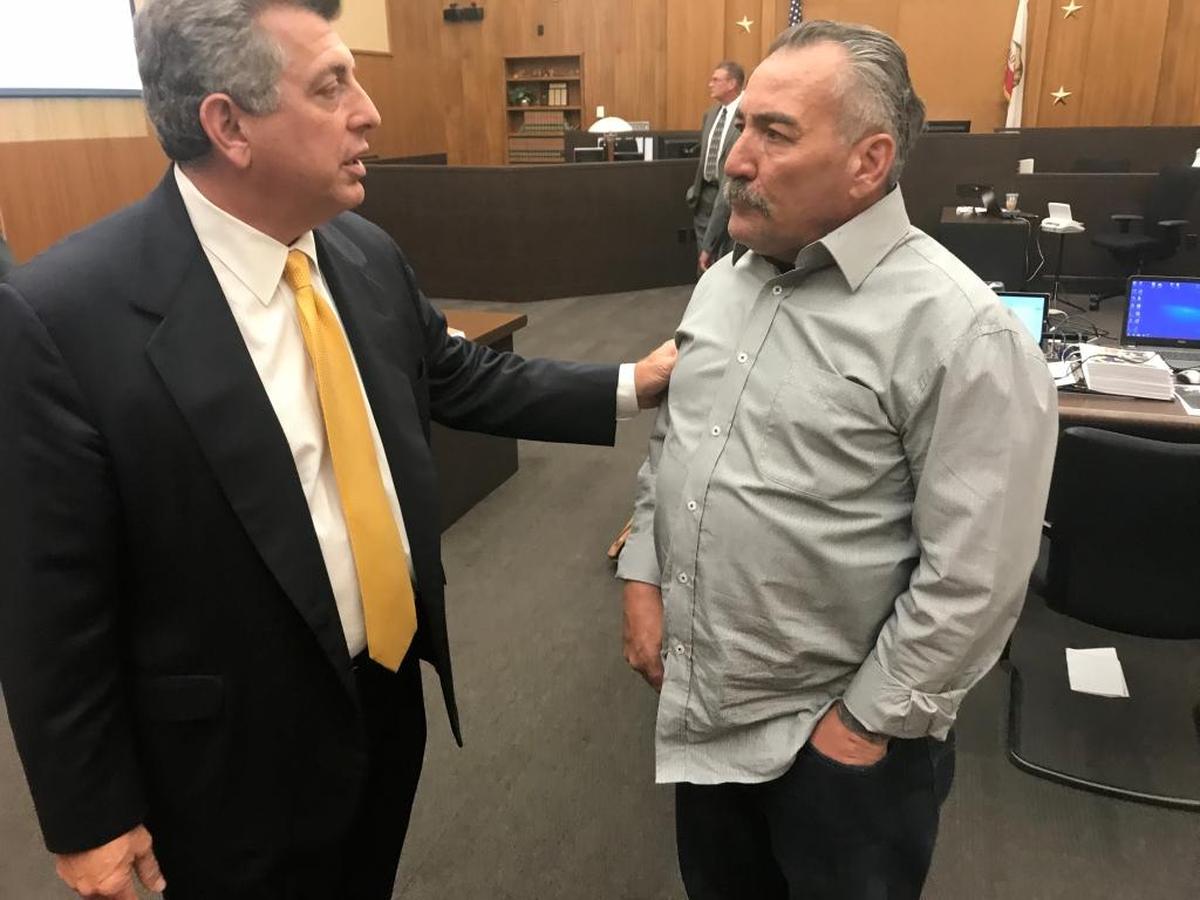 Steven Kennedy, 51, of Clovis, talks with his lawyer, Warren Paboojian, during a break in a civil trial that probes whether the intersection at Cedar Avenue and Bulldog Lane near Fresno State is dangerous. Kennedy sued the city of Fresno after he was involved in a motorcycle accident at the intersection in April 2014 that resulted in him suffering serious injuries.