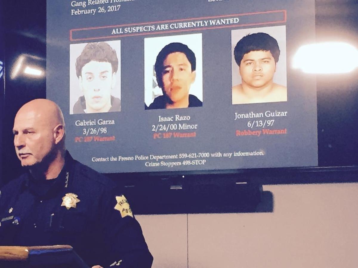 Fresno Police Chief Jerry Dyer discusses the murder case of Amber Baker, who was shot inside her Fresno Apartment. Two men wanted on murder charges and a third man sought in connection with the case are pictured behind him.