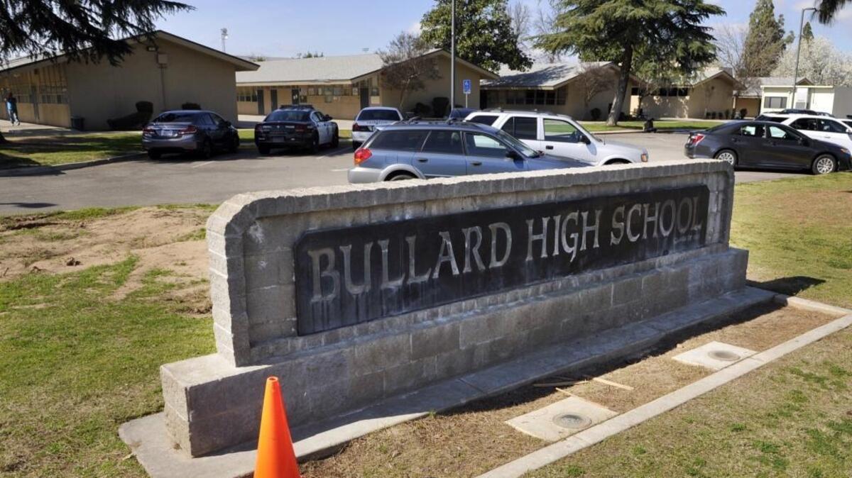 Fresno police are searching Bullard High School with bomb-sniffing dogs after someone called the library and said something would blow up at 11:55 a.m.