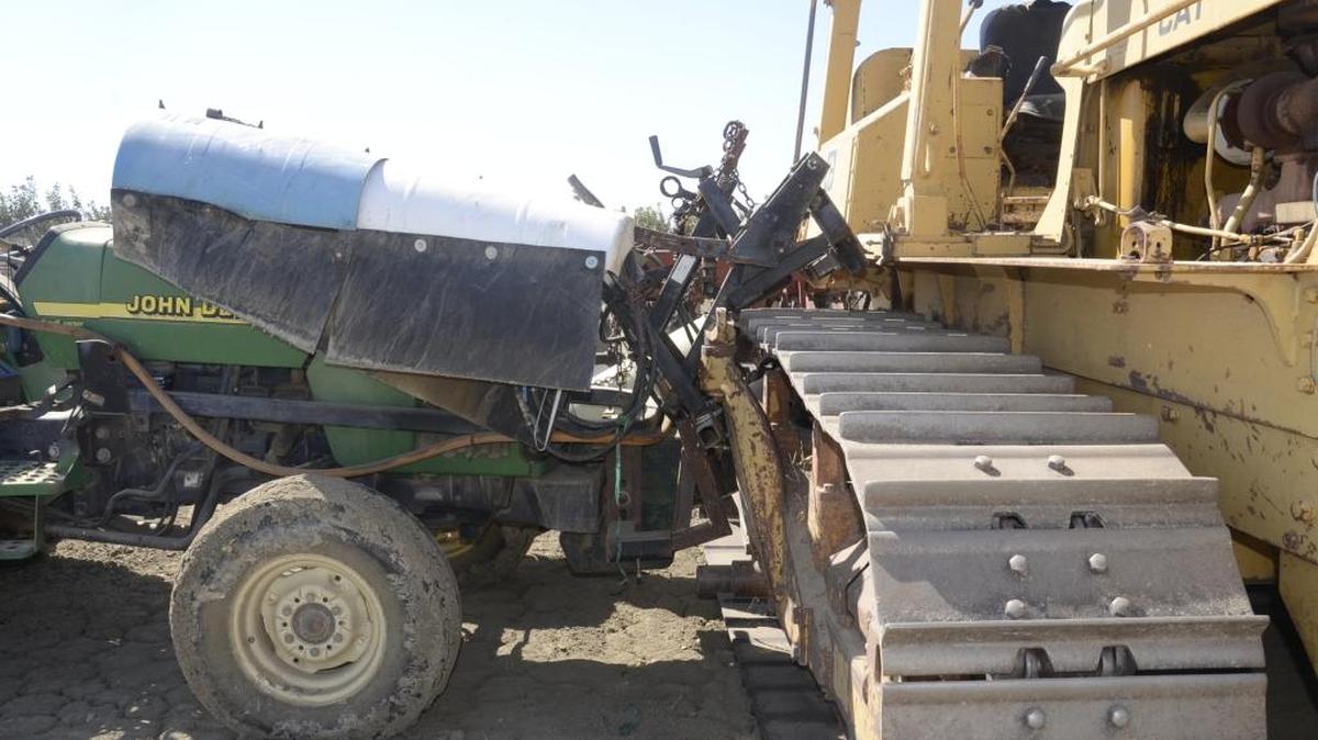 This John Deere tractor was found pinned against a bulldozer after it had been used to run over some recently planted pistachio trees. It will cost about $2,500 to repair, the Fresno County Sheriff’s Office reported. It was one of two tractors reported stolen Sept. 16.
