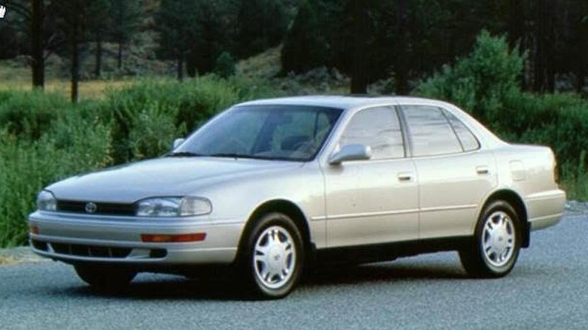 A Toyota Camry or similar car is the suspect vehicle