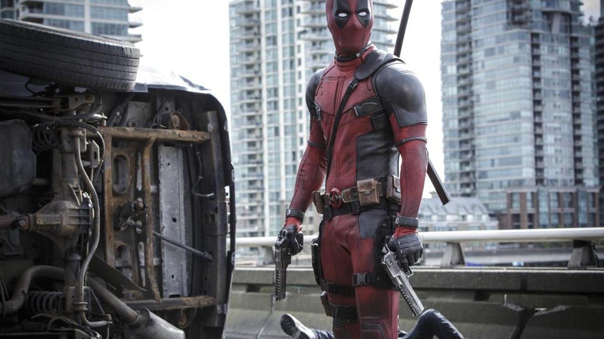 This image released by Twentieth Century Fox shows Ryan Reyonlds in a scene from the film, “Deadpool.”