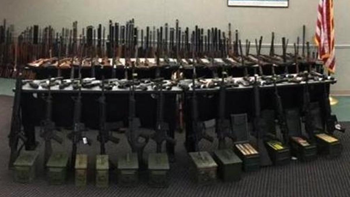 Hundreds of guns seized from Clovis resident Albert Sheakalee were displayed at a news conference presented by the state Department of Justice in November 2015.