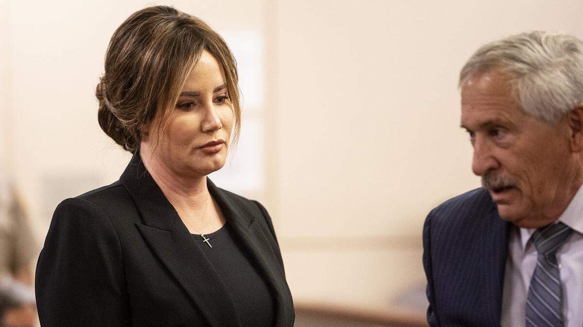Lori Gallo, left, turns to leave the courtroom with attorney Peter Jones, right, after appearing in Merced County Superior Court on Thursday, Nov. 17, 2022. Gallo, the wife of a San Joaquin Valley cheese tycoon, pleaded no contest Thursday, Feb. 23 to felony drunk driving charges after causing a multi-car crash in Merced on Jan. 22, 2022.