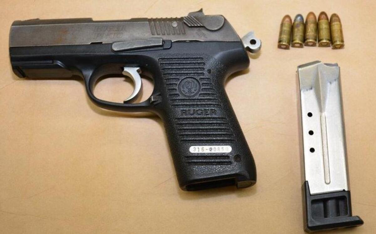 The gun that Fresno police say an Edison High student was carrying in a backpack Friday at the campus.